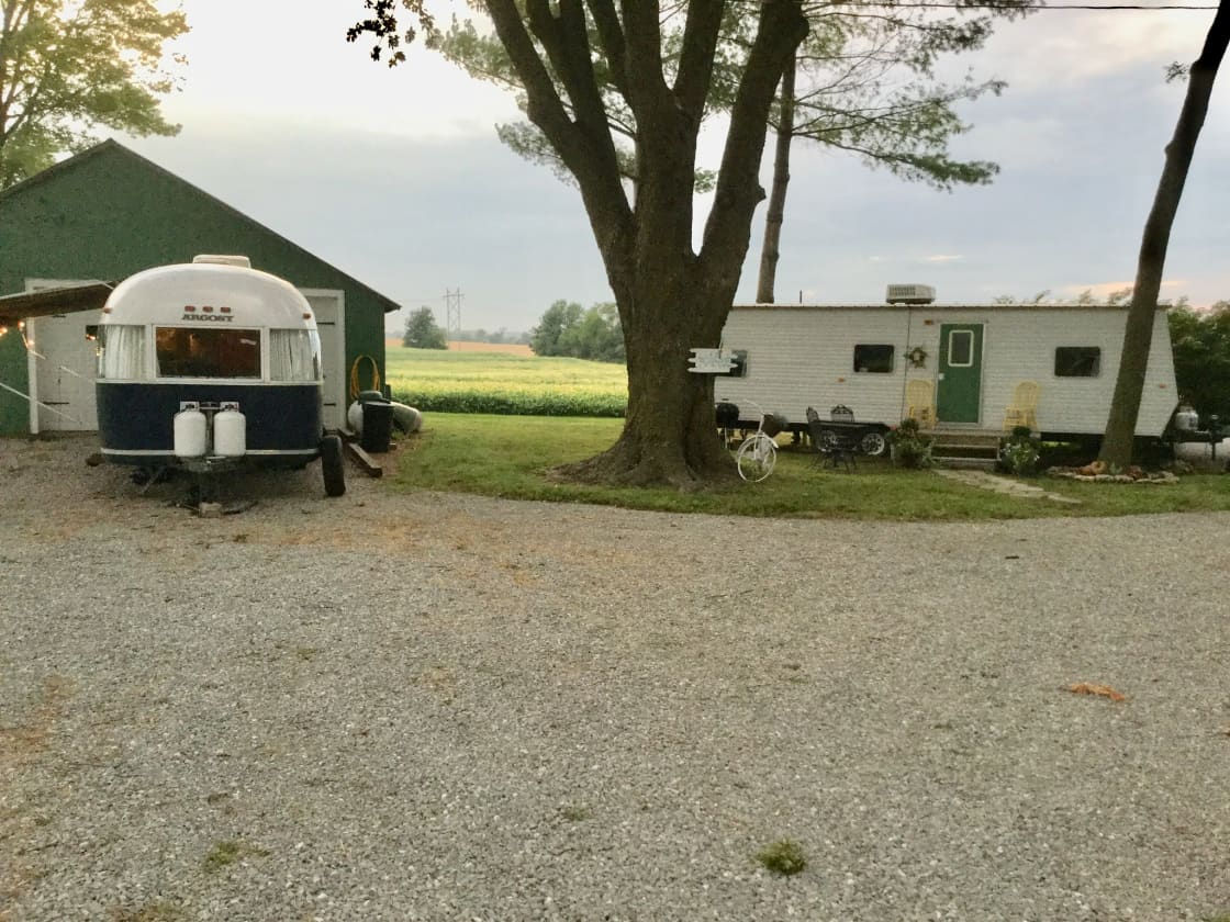 If you have an RV and your friends do not.  They can rent our onsite travel trailer with queen size bed, full size bathroom, dinette, relaxing area and tiny kitchen. Located right next to your RV parking site.