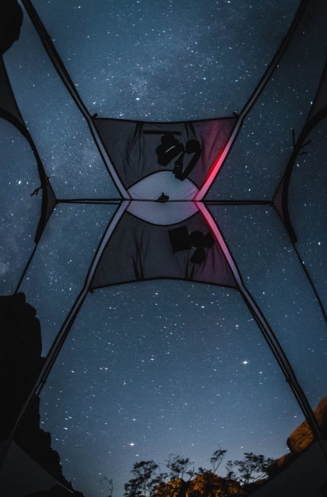 See the stars and moon at night above your bed.  (Our tent does not have this gear rack - view above bed is unobstructed.)