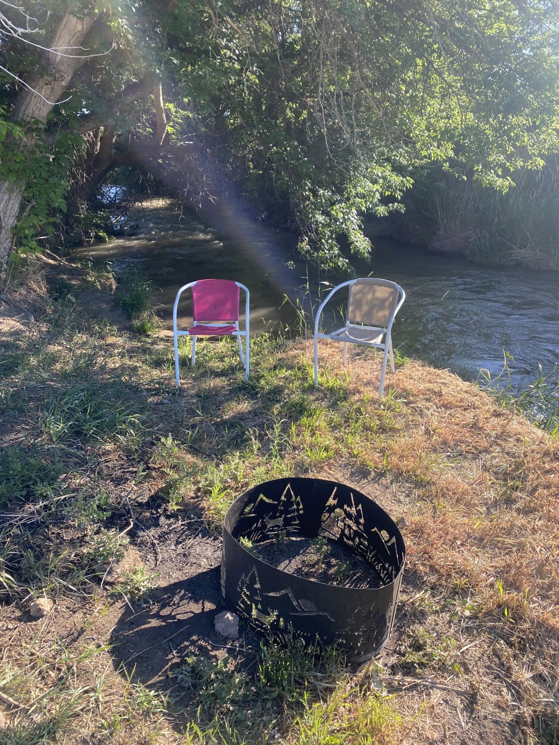 Seating right by the creek, just feet away from your RV spot. 