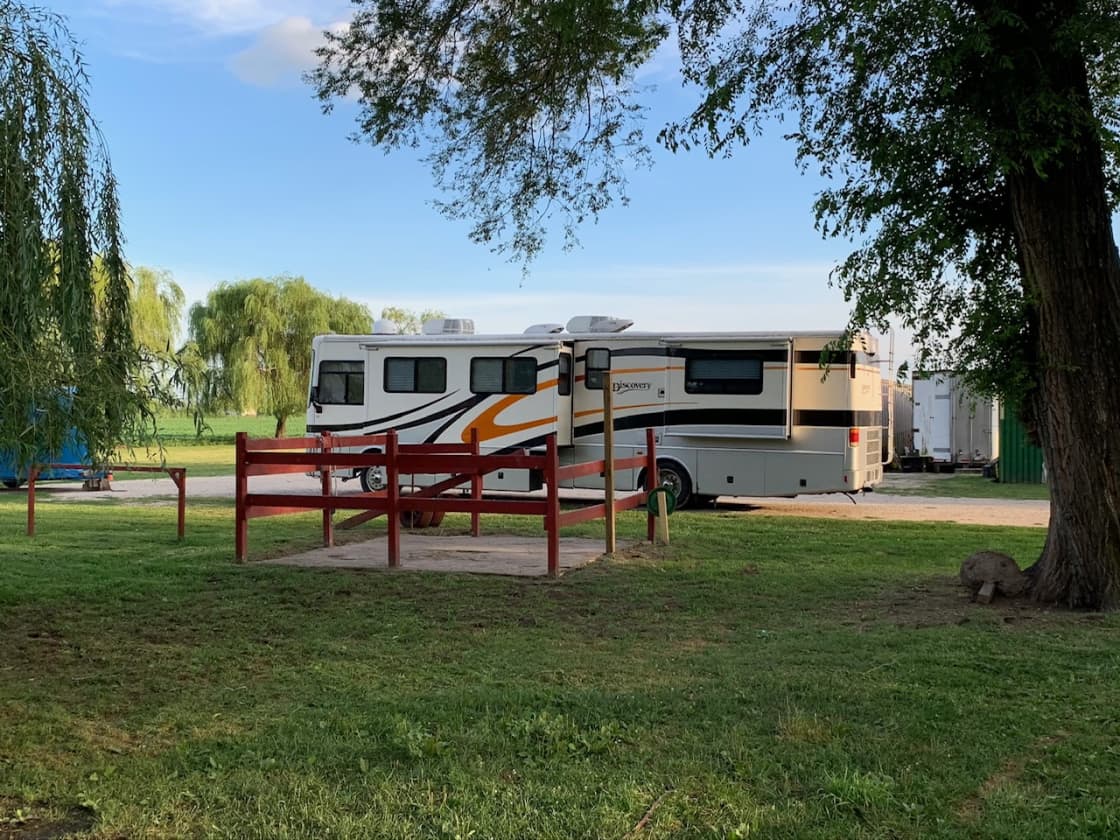 Example of a 37' camper trailer that can easily drive over our driveway hill at Happy Trails Farm.  If you have a super low drop, you may want to ask first.  But this RV had plenty of room.  