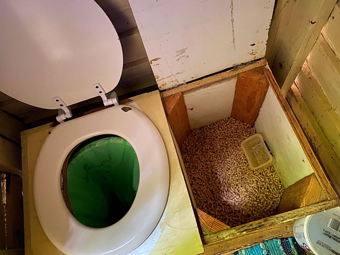 Here is a pic of the composting toilet right out the door of the treehouse.