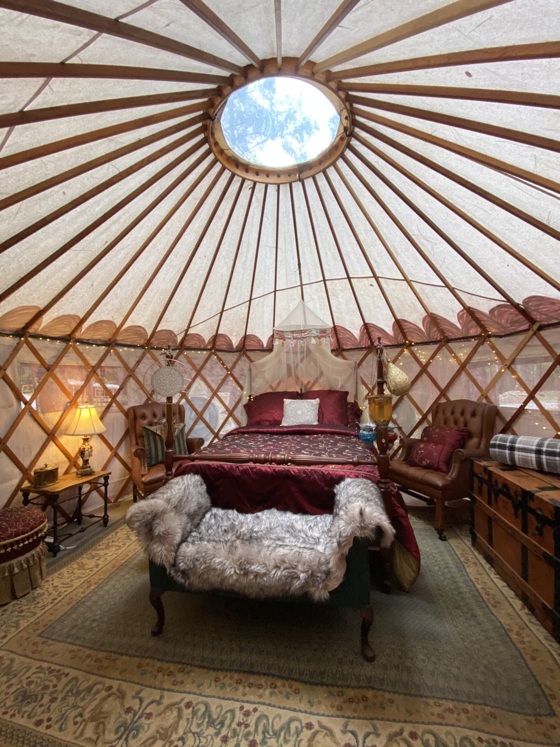 Victorian-Boho decor, a cozy full-size bed for a romantic getaway for two.