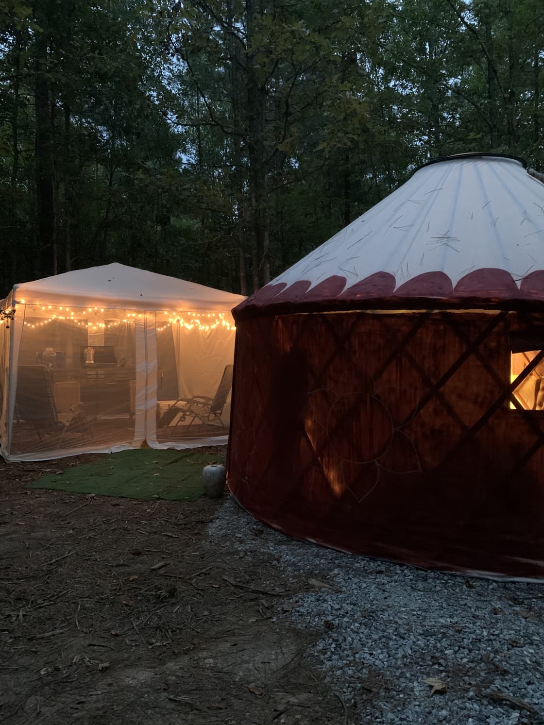 Yurt setup at night, easy access to your very own kitchen.