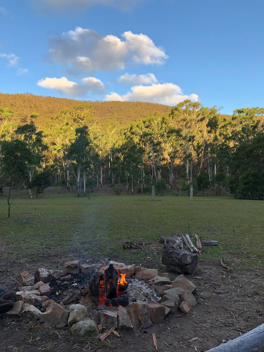 As the sun backfills the valley floor from west to east, its a campfire breakfast at Hanging Rock campsite (aspect NW towards the Mt William ridge) 