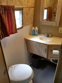 Full Bathroom with Hot water, shower, and flush toilet