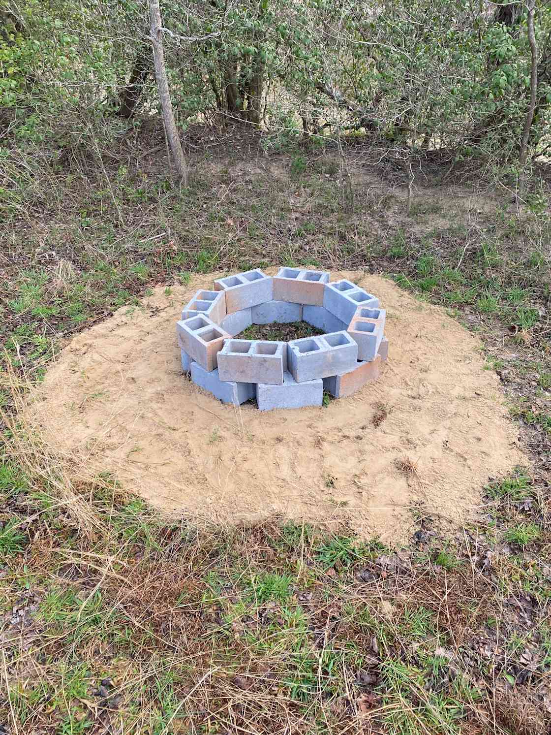 Fire ring near the river for safe and fun campfires!