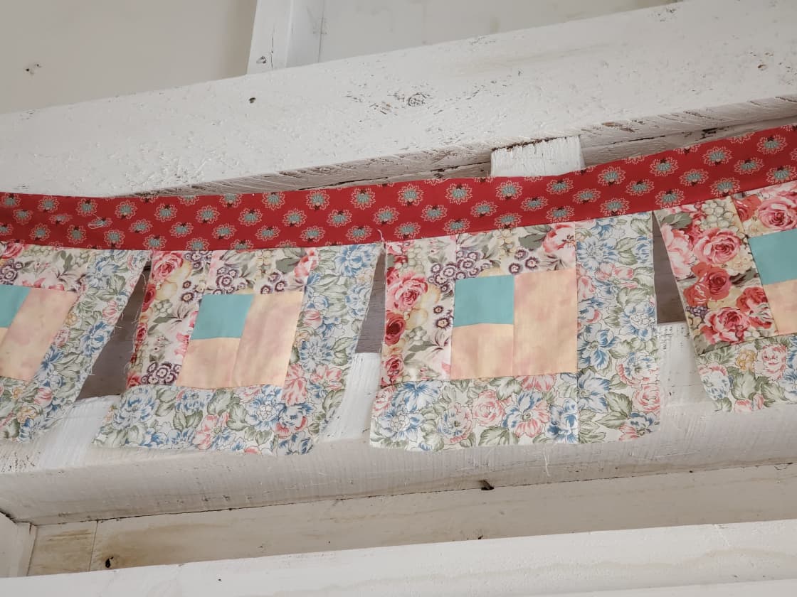 Quilted prayer flags add to the peaceful nature of the Bird's Nest.