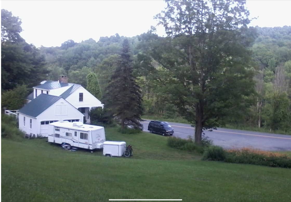 Bus Campers, Tall Campers, and towed Trailers may park in front of the home, and enjoy my three acre yard. Van Campers may drive into the driveway area. Do not block garage. 