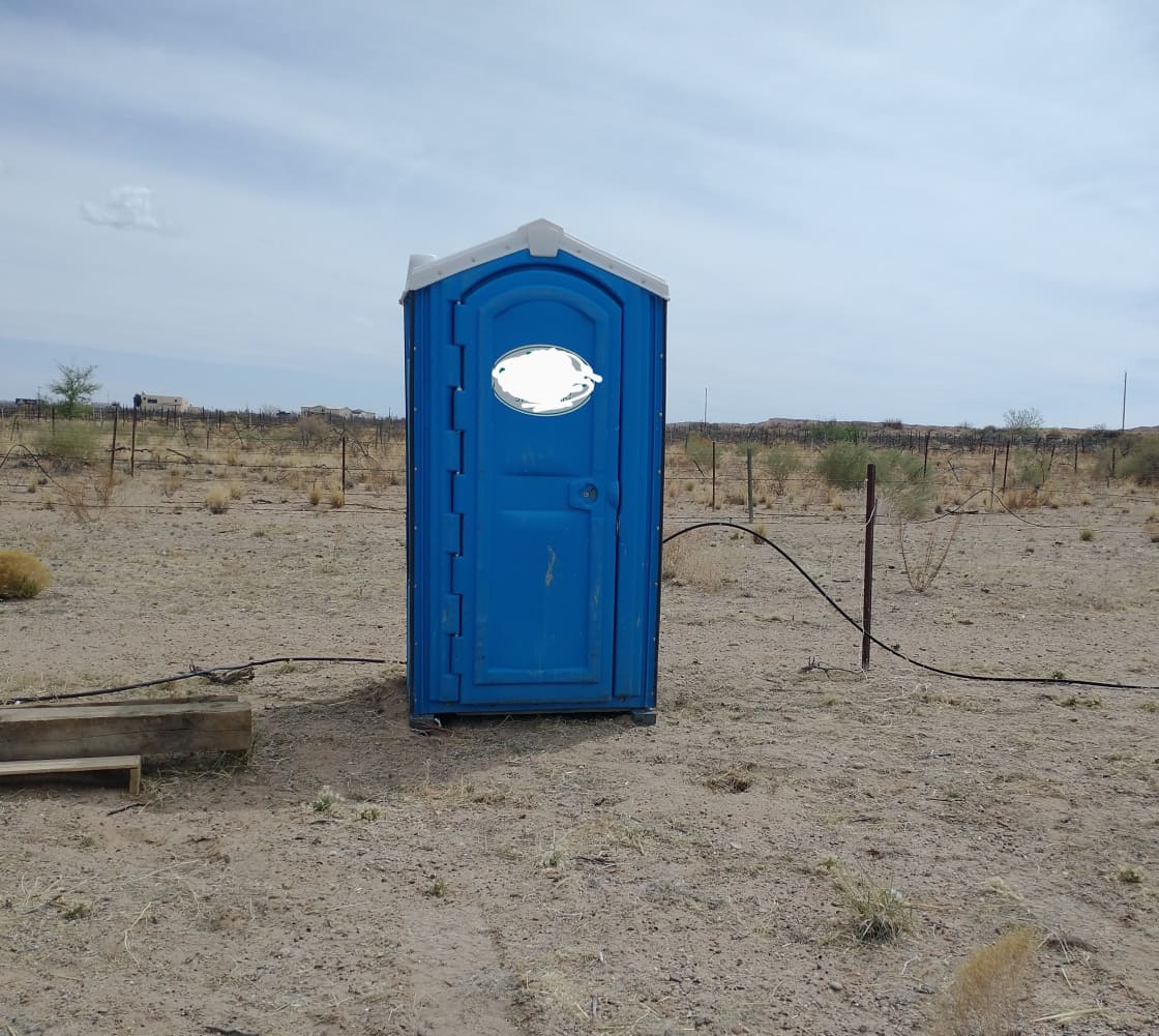 Portable toilet available for guests