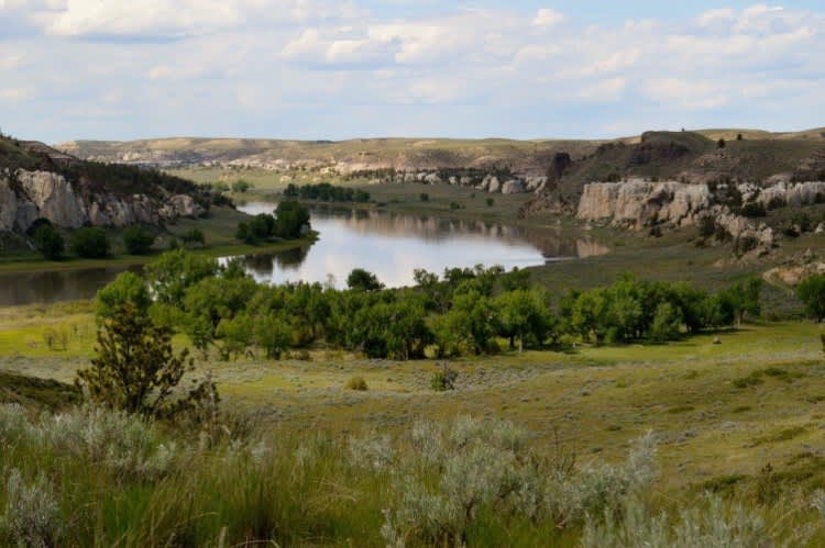 Overlooking the Missouri River. You have many options on where you want to pitch your tent.  There is a designated campground or you can venture out and camp anywhere along the creek and river.