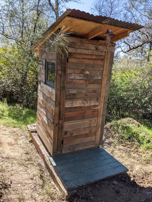 Our outhouse. Stylish and clean!