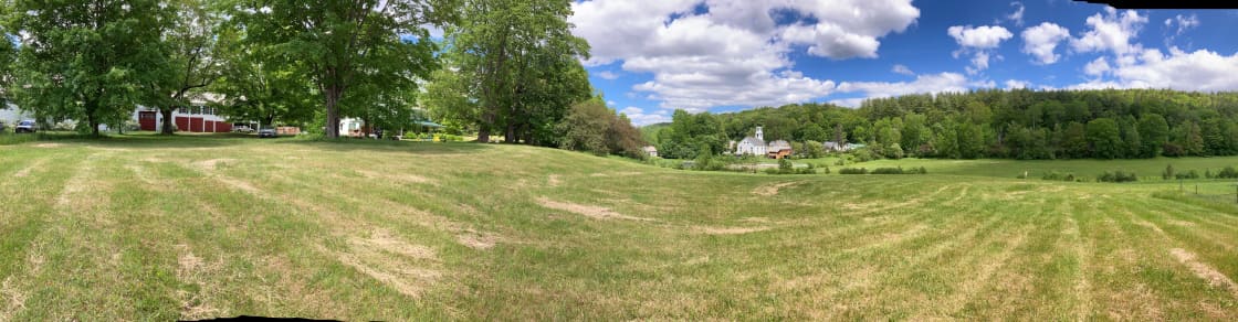 Out in the meadow --with the barn & farmhouse on the left and Guilford Center on the right (including Guilford Free Library,  Historical Society,  Universalist Meeting Hall). Out of view but close is the Broad Brook Community Center -former Grange Hall.