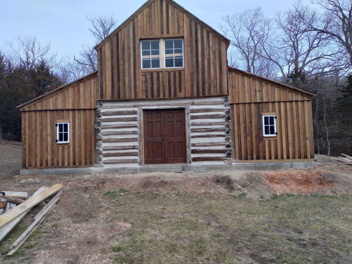 Rebuild of 116 year old barn in the process of restoration with reclaimed materials