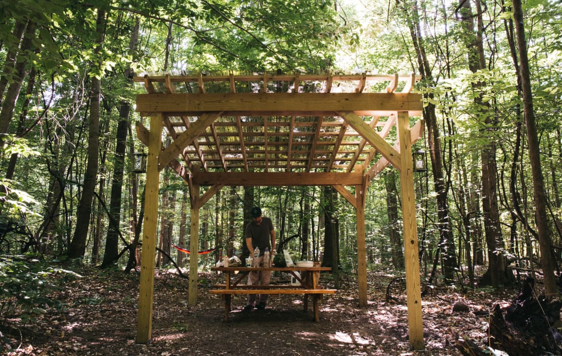 Cook, eat, relax and more under the pergola at site 2!