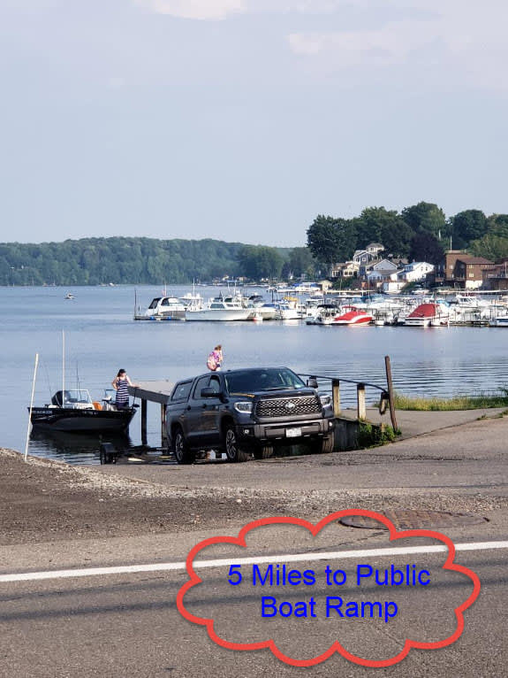 5 minutes down the road is a public boat launch , no fee.  Parking is available across from the launch.