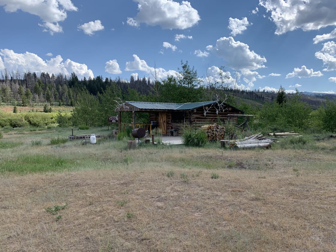 640 acres with rustic cabin on a creek bank. Cabin has no electricity or running water 