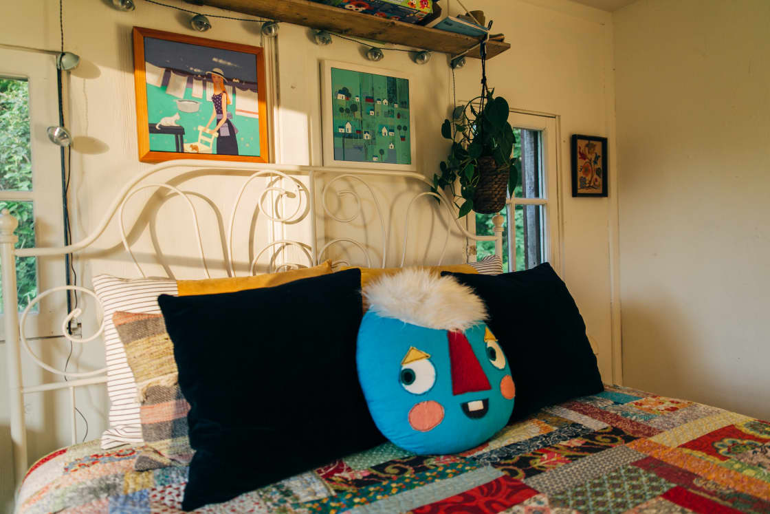 I like to make bright-fun-happy spaces... with silly pillow faces!