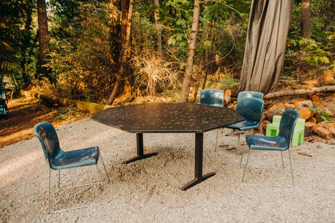 A big table and chairs available for anyone in the campground to use