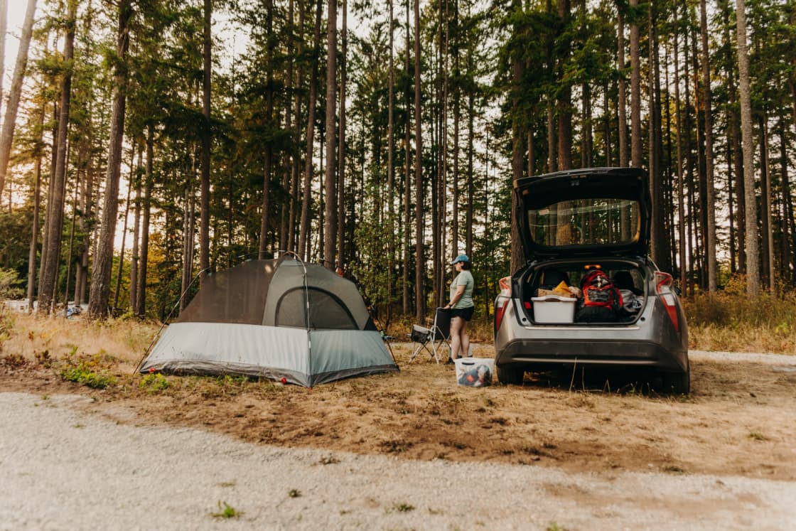 Enough room for a tent, car, fire, chairs, and small table