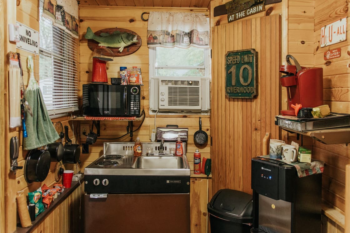 Fully stocked kitchen with Keurig and microwave