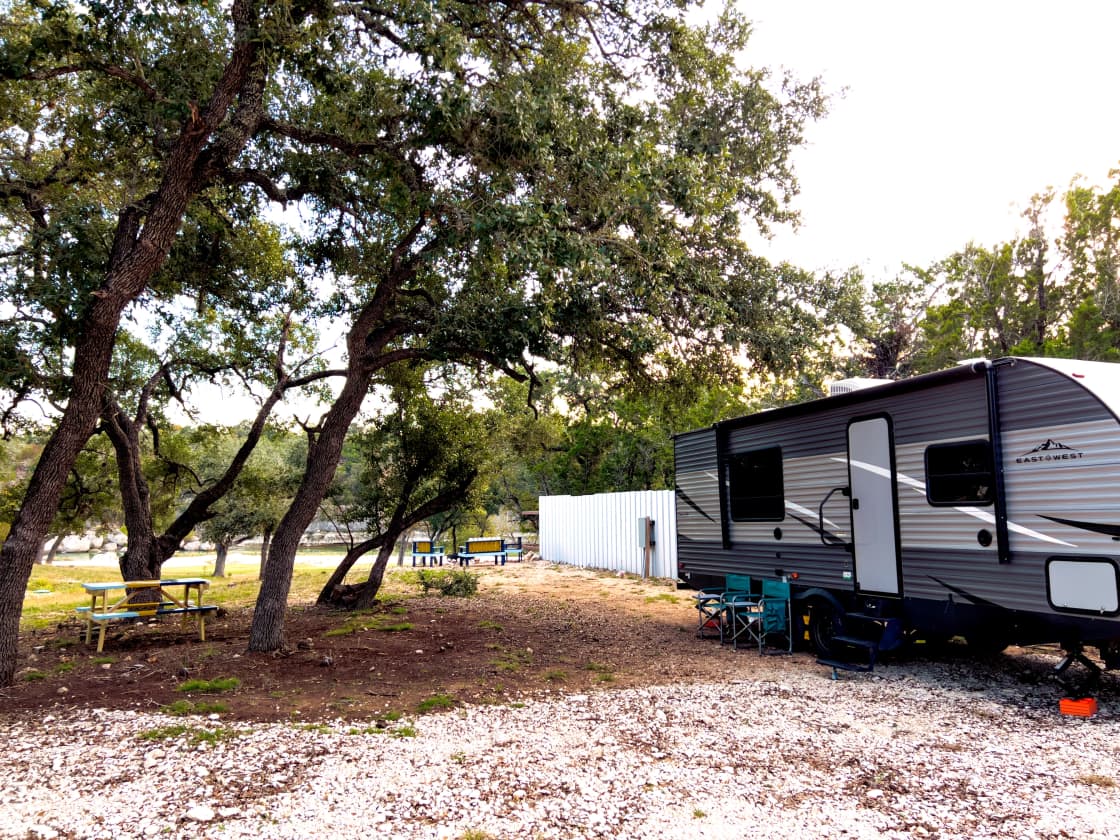 RV Site 1: Your cozy haven, complete with a welcoming picnic table and fire pit seating – the perfect recipe for outdoor memories. 🏕️🔥🍽️