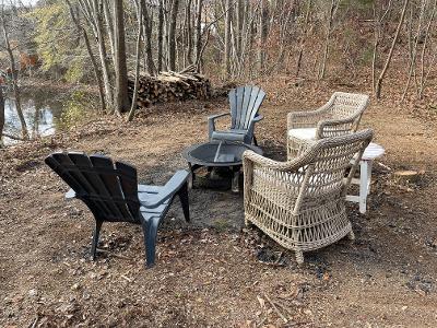 Firepit and tons of free firewood!  Additional rattan chairs upon request available