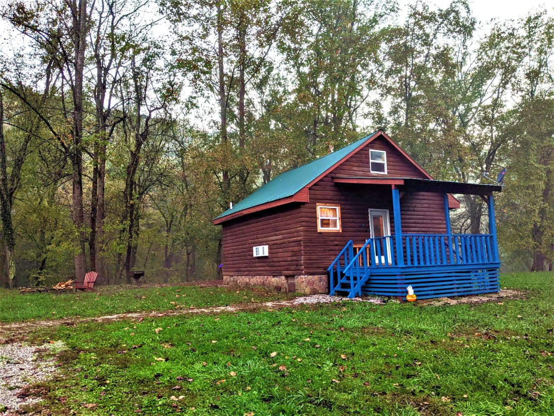Front view of Blue cabin. Rockcastle River runs parallel to the property behind and 40ft below this cabin. 