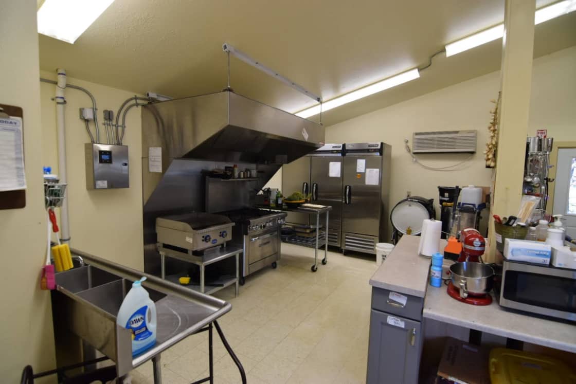 Commercial sized kitchen that is shared with all visitors