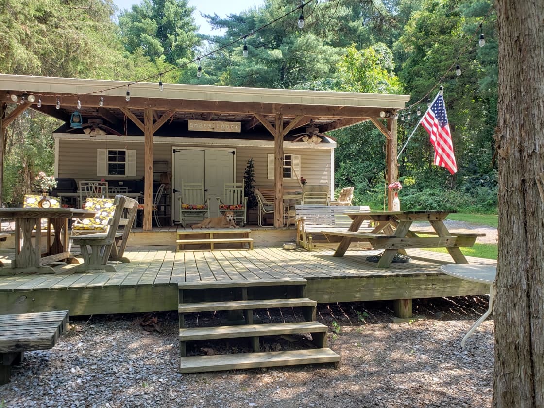 Amber Lodge and the large open air deck and the covered deck. The decks can seat over 24 plus people.