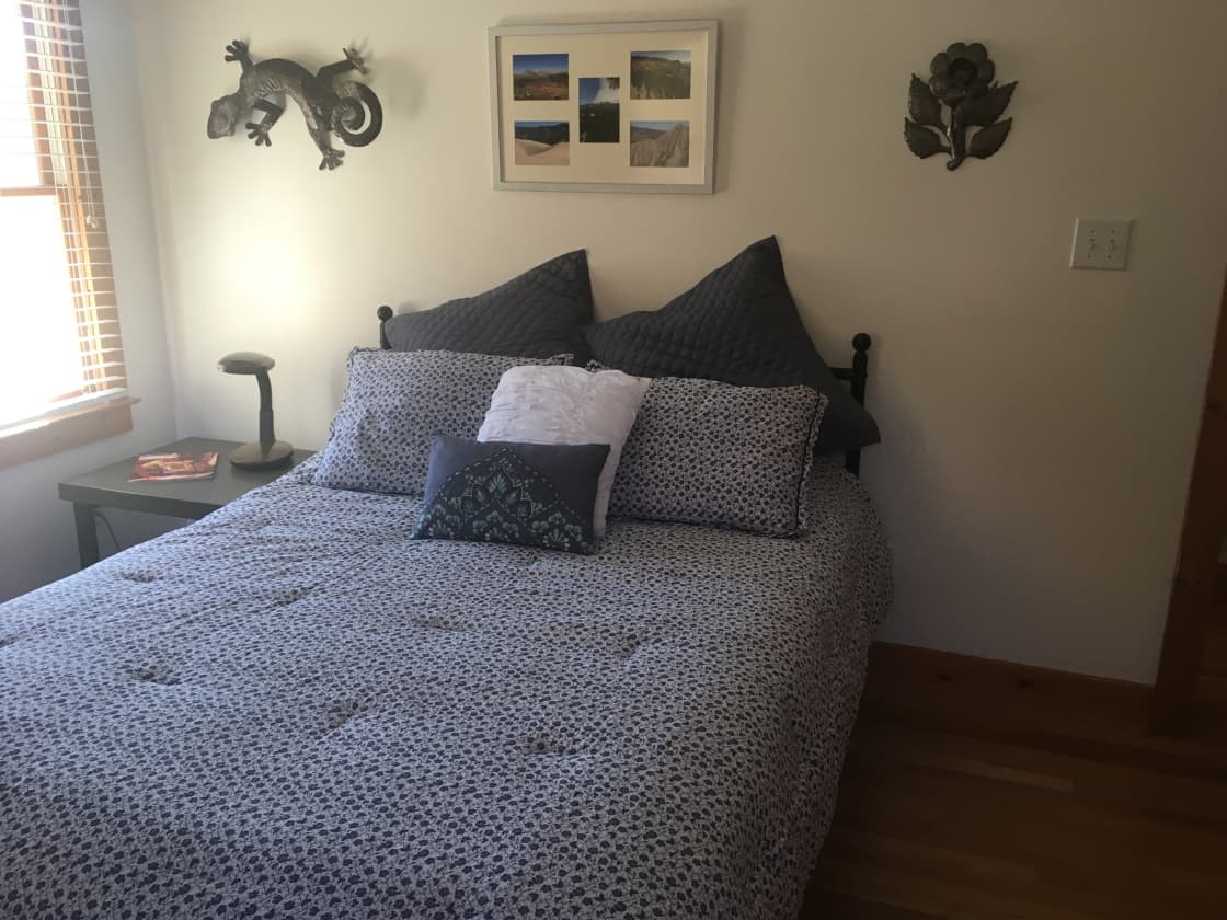 Bedroom with queen bed. 