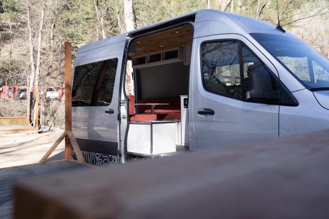 Vanlife site deck. Your van pulls up right next to the deck for easy access and convenience