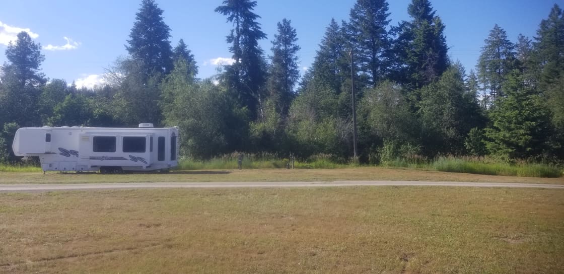 Full hook up lot to right of RV. RV vacant when lot when lot is reserved. Dry campers may access water and possible toilet and shower in RV if vacant for fee