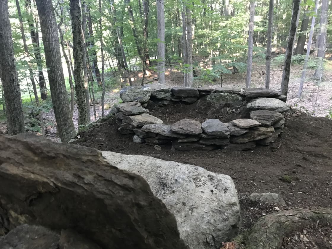 The lookout has a unique fire pit that sits at the edge of a steep rock outcropping.