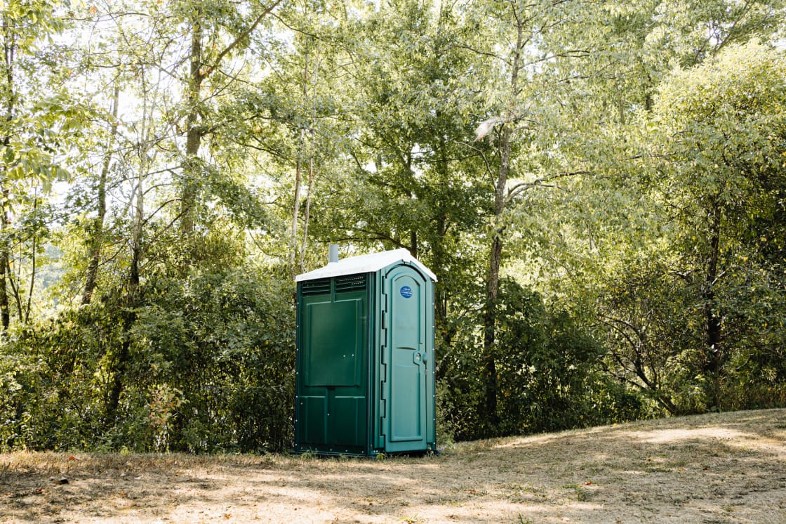 Portapotty isn't too close to any site. Perfect location but not too far walk for anyone.