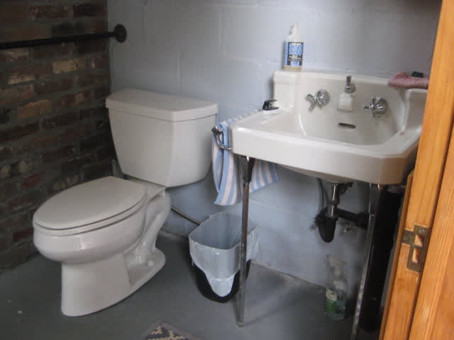 Bathroom with sink and toilet.
