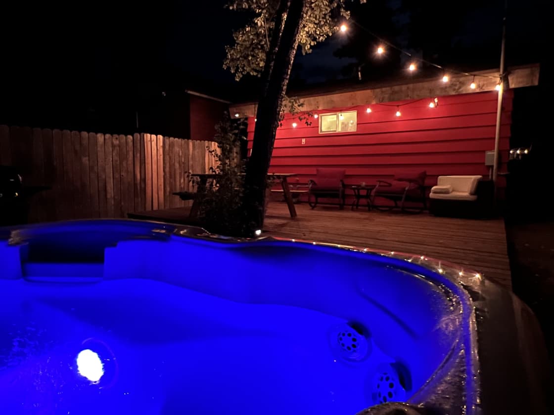 Massaging hot tub in private backyard

