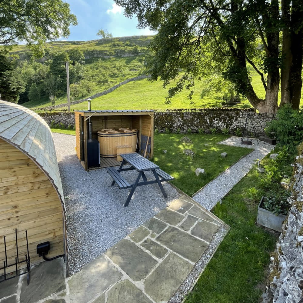 Private hot tub and fire pit area for Pheasant Pod
