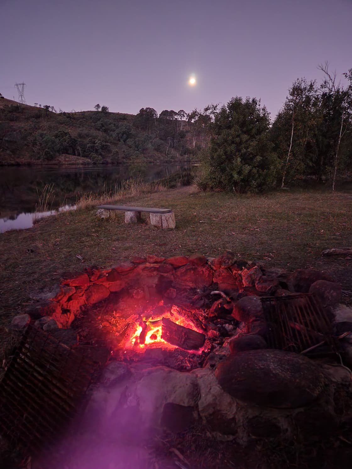 A campfire, a moon and birdsong.