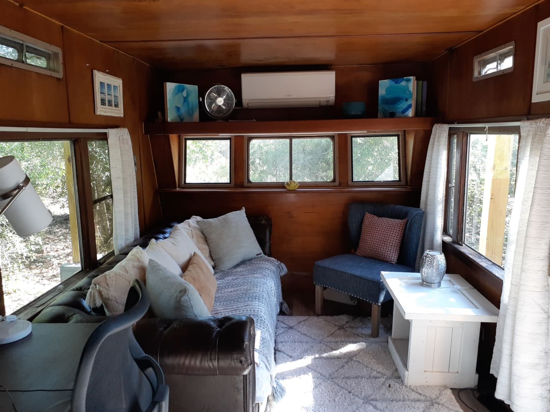 Bright living room inside the camper.