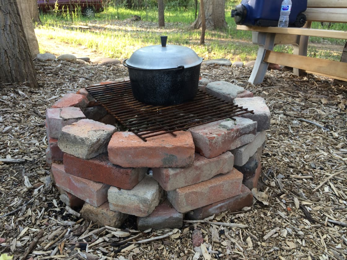Charming fire ring made of antique bricks from an old silo.
