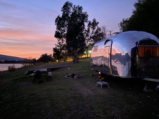 Reflecting sunset from a vintage Airstream 