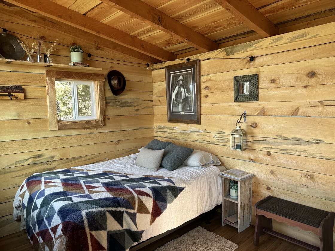 Interior queen bed cabin
