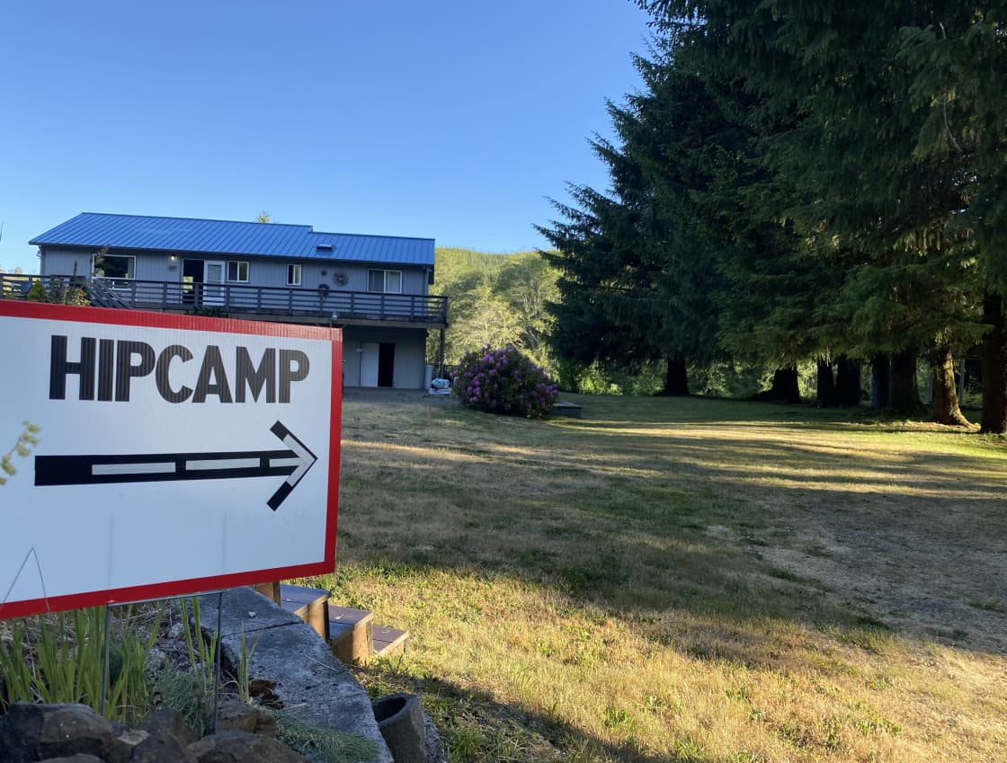 When you pull into the driveway you’ll see this sign, veer to the right to the campsites.