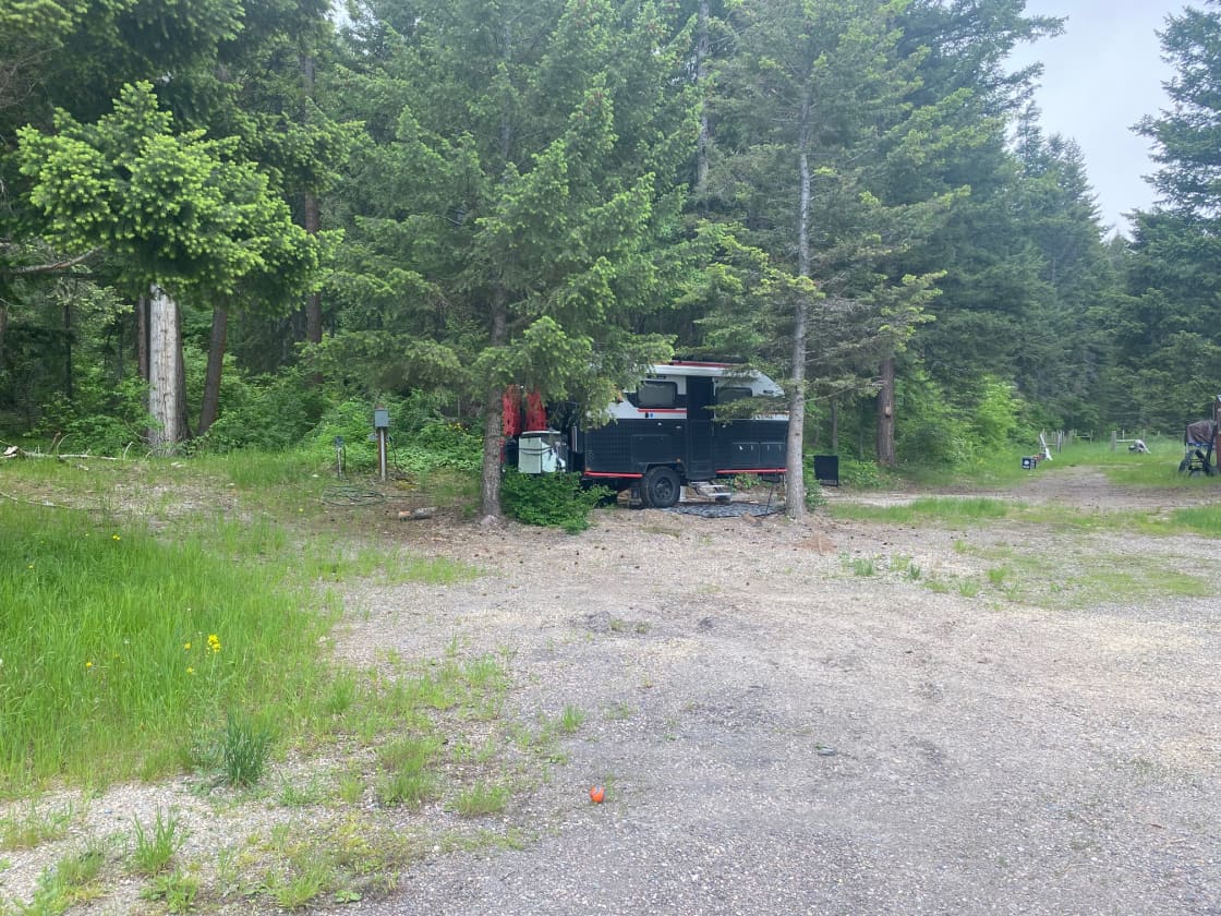 15' bumper pull trailer for reference. This is the campsite. You’ll see the power box, spigot, and a large white and some orange paint pvc for septic (tall pipe to mark it. Pull it off to dump black. Let grey water out in driveway) 