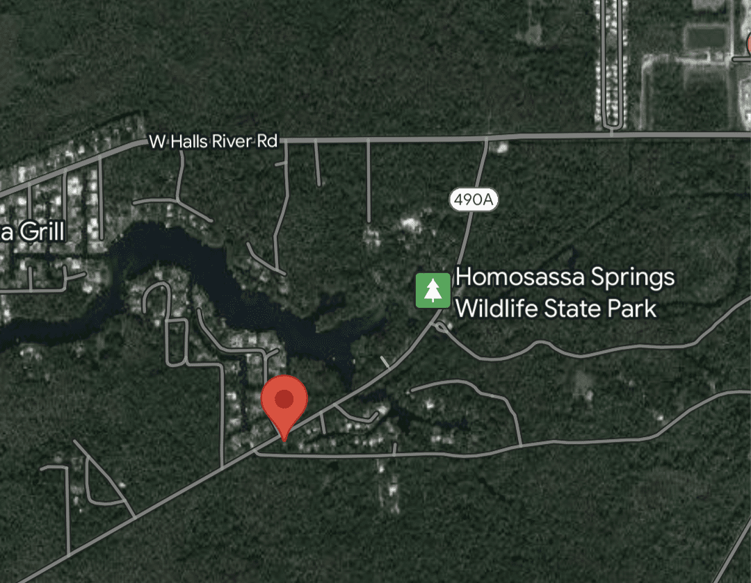 The site is located on the edge of a quiet waterfront community along the Homosassa River and next to 13 acres of undeveloped land. This site is NOT waterfront.