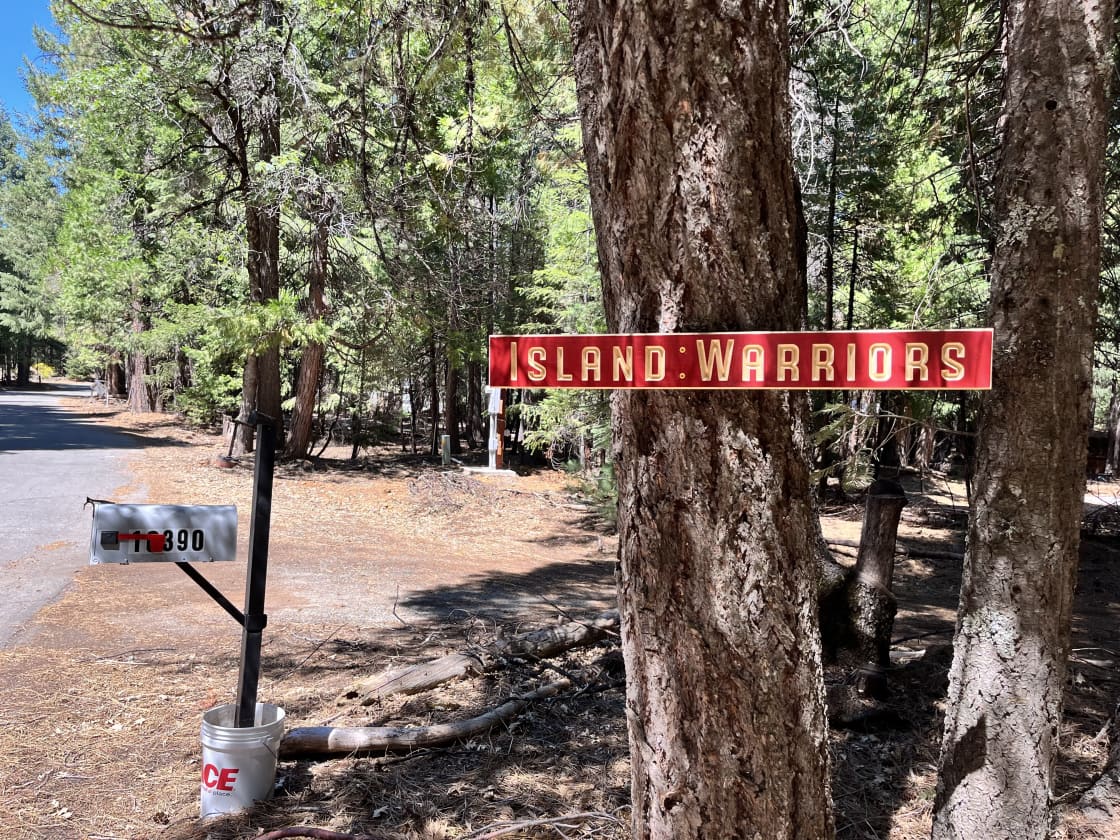 Property will be in your right side. Look for the Island Warrior sign on the tree at 10390 Ritts Mill Road. Turn into the driveway. Make a left in front of the cabin and continue to your campsite past the shed.