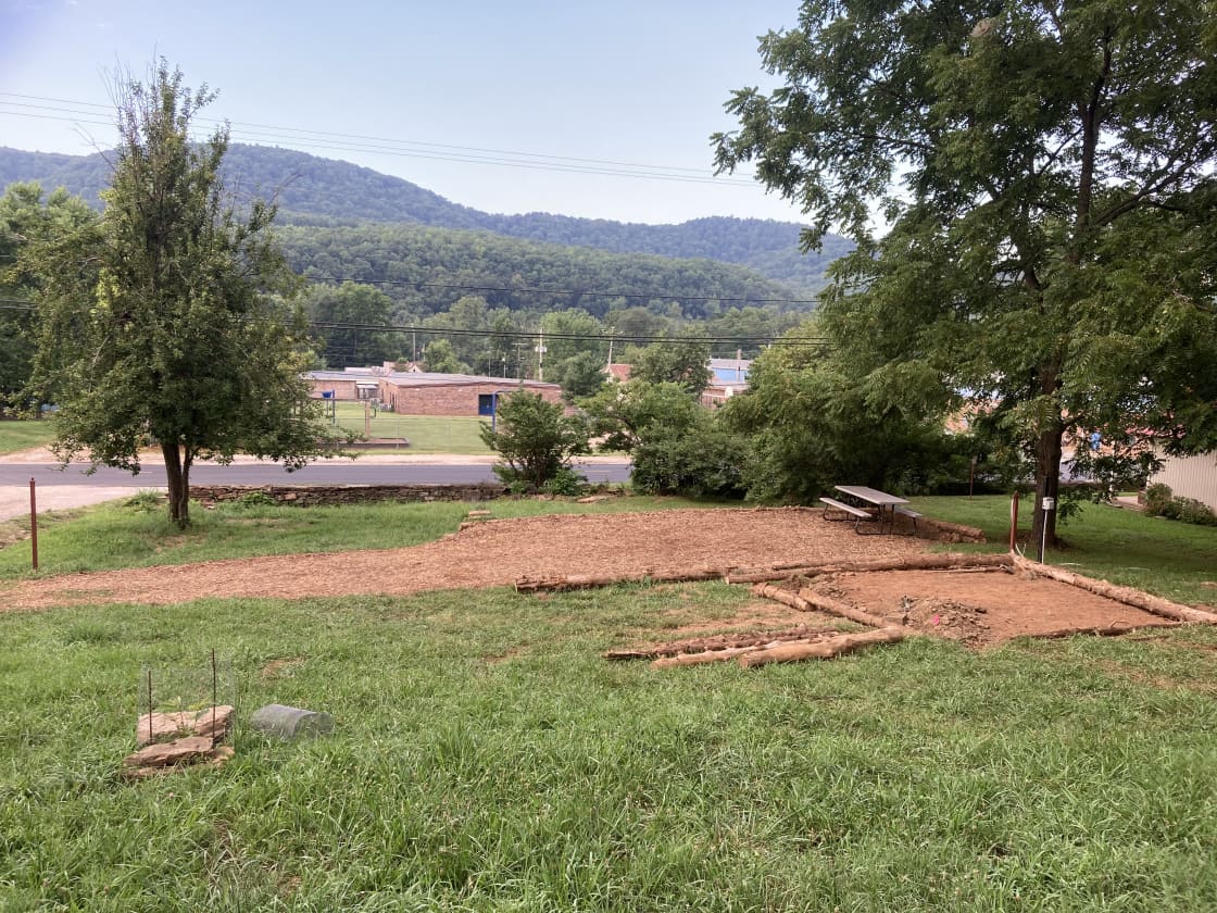 This is a new site and ready for visitors but I'm still working on beautification!  The square area is the new, level tent pad being finished.