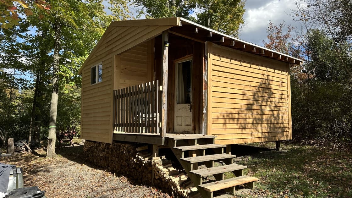Updated for fall 2023! We are enclosed part of the deck to create additional sleeping space inside the cabin!  New siding (more air tight- less drafty). Still working on it -  cabin is open for farm stays!  