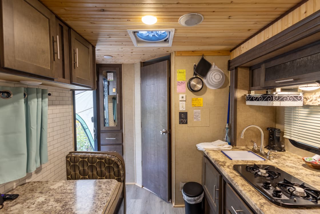 Functional mini kitchen inside camper.