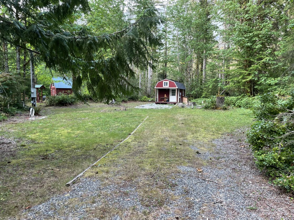 The camp lot has flat space for vans, tents and RVs. Inside “the shed” you’ll find a beautiful cedar sauna, kitchen sink, counter, hot water kettle, and compost toilet. 